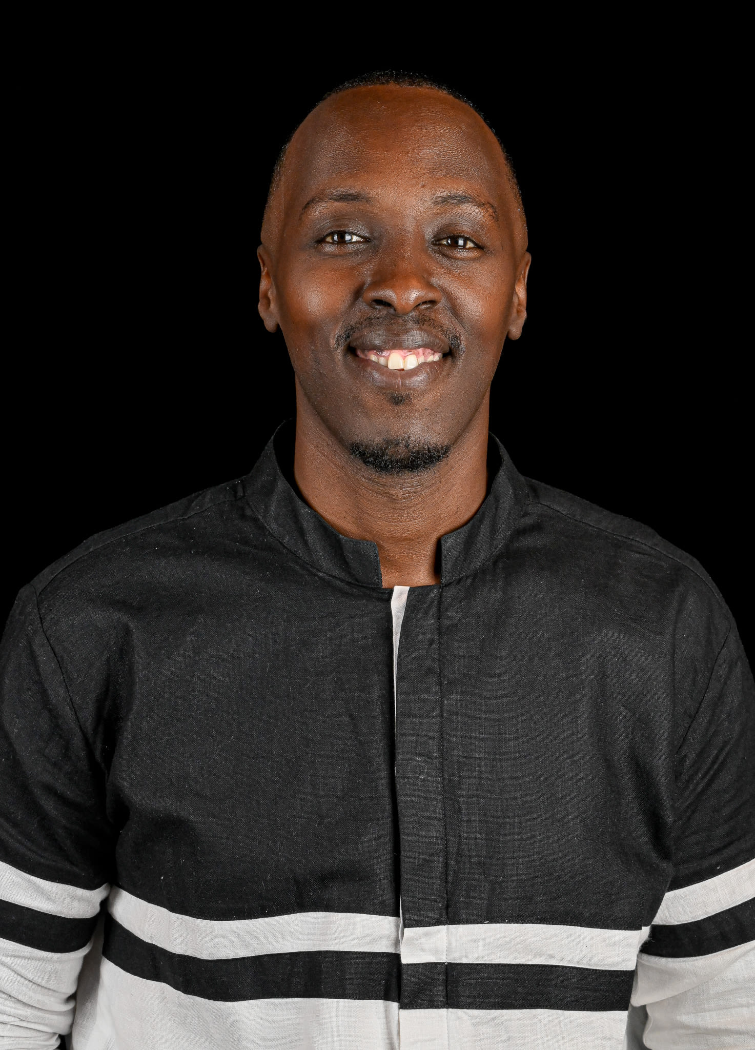 Malik Tambwe headshot