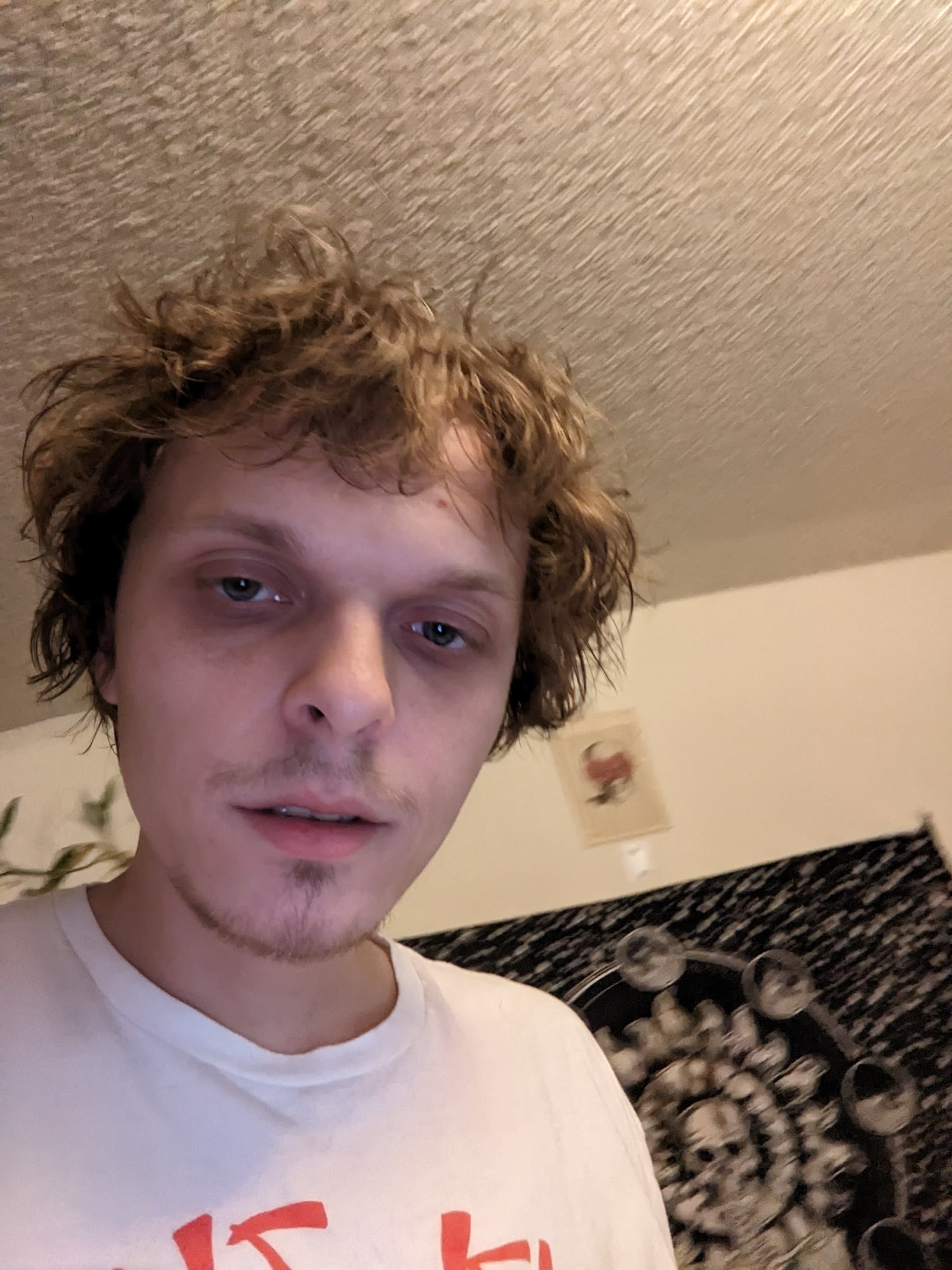 Elijah Mang headshot